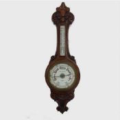 A nineteenth century carved oak aneroid wheel barometer, by Horne and Thornethwaite, 416 Strand,