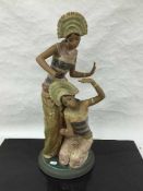 A Lladro bisque figure of two girls dancing in traditional dress, height 53cm.