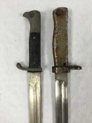 A scarce German steel hilted mauser bayonet, together with a German parade bayonet.