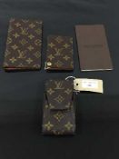 A Louis Vuitton address wallet, monogram canvas,