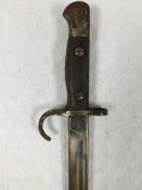 A rare 1907 Enfield Sword Bayonet with scabbard and intact curved quillion,