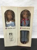 A collection of Sasha dolls and related items including 508 Baby Brunette White Bird,