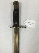 An American manufactured 1907 sword bayonet, the blade stamped Remington 1913, leather scabbard.