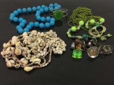 A large collection of costume jewellery, beads, necklaces etc.