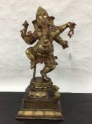 A patented brass figure of Ganesha, on stepped base, height 42cm.
