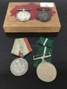 A Navy Long Service and Good Conduct Medal, George V, named to 7869 F.H. Shellum. S.B.P.O. R.N.A.S.