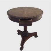 A nineteenth century carved walnut occasional table, fitted with drawers,