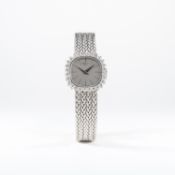 A LADIES 18K SOLID WHITE GOLD & DIAMOND CHOPARD BRACELET WATCH CIRCA 1980, REF. 514
D: Silver dial