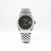 A GENTLEMAN'S STAINLESS STEEL ROLEX OYSTER PERPETUAL DATE BRACELET WATCH CIRCA 1970, REF. 1500