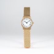 A FINE LADIES 18K SOLID GOLD & DIAMOND CARTIER BRACELET WATCH CIRCA 1990
D: White dial with black