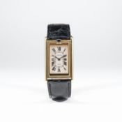 A RARE GENTLEMAN'S 18K SOLID GOLD CARTIER TANK BASCULANTE WRIST WATCH CIRCA 1990s
D: Silver