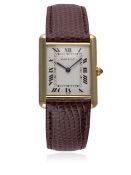 A GENTLEMAN'S 18K SOLID GOLD CARTIER TANK WRIST WATCH CIRCA 1990s D: White dial with Roman