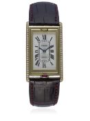A FINE & RARE GENTLEMAN'S 18K SOLID GOLD & DIAMOND CARTIER TANK BASCULANTE WRIST WATCH CIRCA