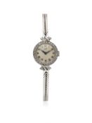 A LADIES 9CT SOLID WHITE GOLD & DIAMOND ROLEX TUDOR COCKTAIL WATCH CIRCA 1950s D: Silver dial with