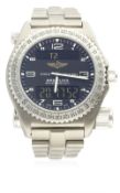 A GENTLEMAN'S TITANIUM BREITLING EMERGENCY BRACELET WATCH DATED 2003, REF. E56321 WITH COMPLETE