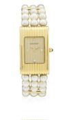 A LADIES 18K SOLID GOLD & PEARL BOUCHERON REFLET BRACELET WATCH CIRCA 1990s   D: Champagne dial with