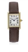 A LADIES 18K SOLID GOLD CARTIER TANK WRIST WATCH CIRCA 1990  D: White dial with black Roman numerals