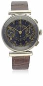 A GENTLEMAN'S DOGMA CHRONOGRAPH WRIST WATCH CIRCA 1940 D: Black dial with gilt Arabic numerals, font