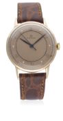 A GENTLEMAN'S 18K SOLID PINK GOLD OMEGA WRIST WATCH CIRCA 1940s D: Salmon pink dial with bi-hourly