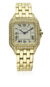 A GENTLEMAN'S 18K SOLID GOLD & DIAMOND CARTIER PANTHERE BRACELET WATCH CIRCA 1990s D: Silver dial