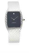 A GENTLEMAN'S 18K SOLID WHITE GOLD GUBELIN BRACELET WATCH CIRCA 1980s, REF. 819 D: Black dial with