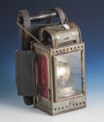 Karbidlampe, Messing, A. Sartorius, Wuppertal 1959. Mit farbigen Glaseinsätzen.Lederhalterung.