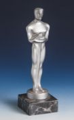 Oscar-Trophäe, Replik, Metallguss auf Marmorsockel, silberfarb., im Art Déco Stil. H. ca.26 cm.