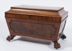 A Victorian mahogany cellarette:, of sarcophagus shaped outline with reel turned mouldings,
