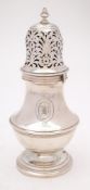 A Swiss silver sugar caster: crested of baluster form with pierced turn-off cover,