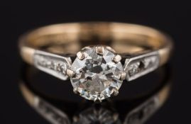 A diamond solitaire ring: the circular, brilliant-cut stone approximately 6.4mm wide x 3.