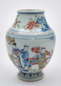 A Chinese wucai vase: painted in underglaze blue,