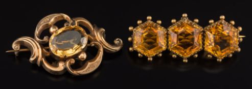A citrine mounted three stone bar brooch: with hexagonal citrines within a beadwork setting and an
