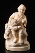 A Japanese carved ivory okimono: Meiji period (1864-1912),