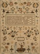 An early Victorian needlework sampler: with central verse surrounded by flowering shrubs and