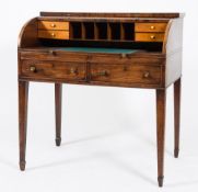 A George III mahogany cylinder tambour fronted writing desk:,