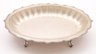 A George V silver serving dish, maker Joseph Rogers & Sons, Sheffield, 1910: of oval outline,