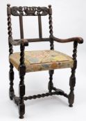 A 17th century carved walnut elbow chair used by HRH Princess of Wales at the 1909 Huccaby Races,