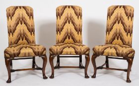 A set of three early 18th Century walnut frame side chairs:,