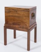 An early 19th Century mahogany and inlaid rectangular cellarette:, bordered with boxwood lines,