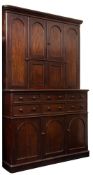 A Victorian mahogany housekeeper's cupboard:, the upper part with a moulded cornice,
