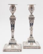 A pair of Edward VII silver candlesticks, maker Hawksworth, Eyre & Co Ltd, Sheffield,