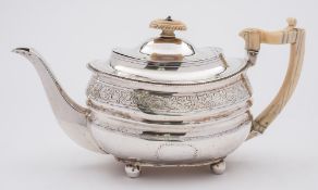 A George III silver teapot, maker Thomas Wallis II, London,