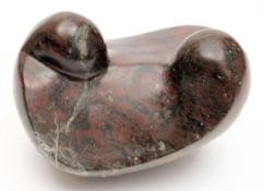 Max Barratt 1937- 1997 A red serpentine abstract sculpture: signed with initials to the base, 19cm.