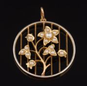 A seed pearl mounted circular pendant: of floral design on fine curb-link chain, 4.