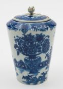 A Worcester blue and white tea canister and cover: of tapering cylindrical form with flower finial,