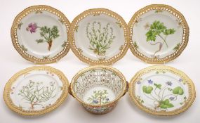 A set of five Royal Copenhagen 'Flora Danica' plates and a matching basket: each piece finely
