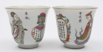 A pair of Chinese porcelain wine cups: of mildly flaring form,
