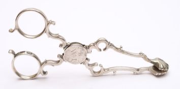A pair of Georgian silver sugar nips,