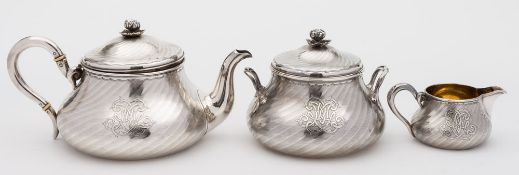 A Continental three-piece silver tea service, retailed by Attcoc Aine,