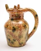 A Donyatt pottery puzzle jug: of shouldered form with raised pierced neck,